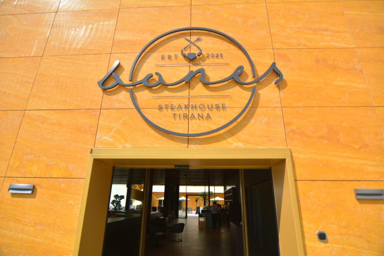 Mk Hotel Tirana Rinas ภายนอก รูปภาพ Entrance of the restaurant