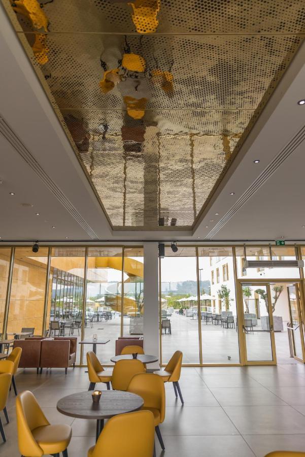 Mk Hotel Tirana Rinas ภายนอก รูปภาพ The ceiling of the lobby