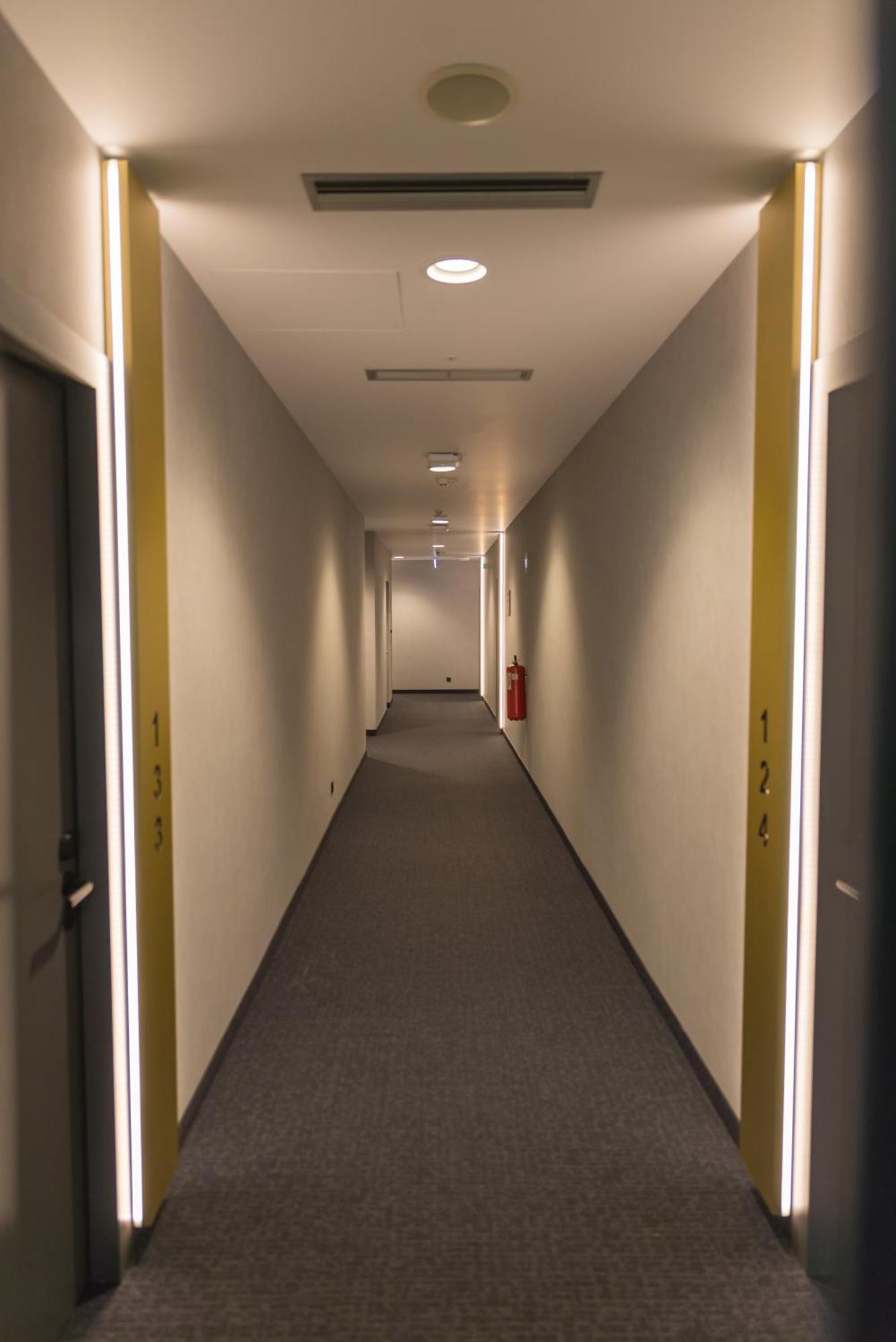 Mk Hotel Tirana Rinas ภายนอก รูปภาพ A corridor in the new building